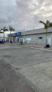 an empty parking lot in front of a store at Studio agnes in Palm-Eagle Beach