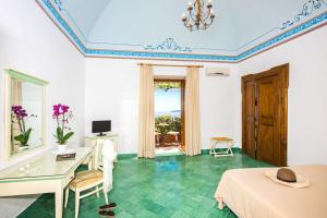 TV a/nebo společenská místnost v ubytování Albergo California