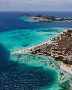 an aerial view of an island in the ocean at Posada Casa Play Los Roques in El Roque