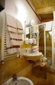 Koupelna v ubytování IL Postale