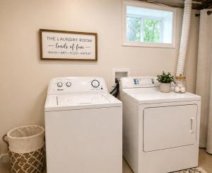 a laundry room with a washer and dryer at Backwater Bliss 3BD, 2BA, Grill, Pet Friendly 20PP in Osage Beach