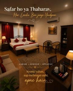 a bedroom with a bed and a living room with a table at Chillout Villa in Wada +1 photo