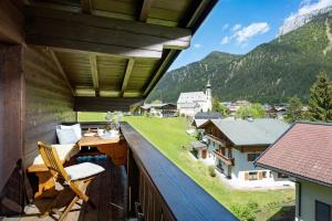 a balcony with a view of the mountains at Haus Steinberg in Waidring