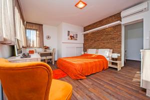Postel nebo postele na pokoji v ubytování Apartments Figarola
