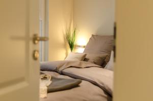 Ein Bett oder Betten in einem Zimmer der Unterkunft Grosse Kirr