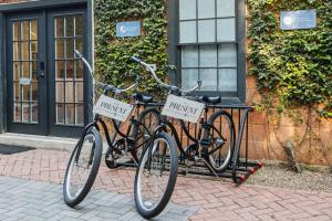 two bikes parked next to each other in front of a building at 4th Floor Queen Suite Boutique hotel in Savannah
