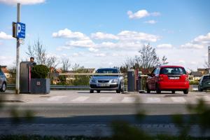 two cars are parked at a parking lot at Old Town Guest Accommodation in Kranj +29 photos