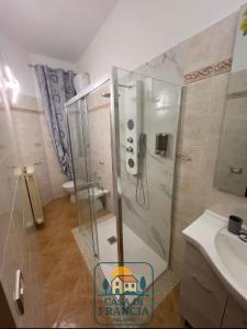 a bathroom with a shower and a sink at Casa Di Francia in Pontedera +13 photos
