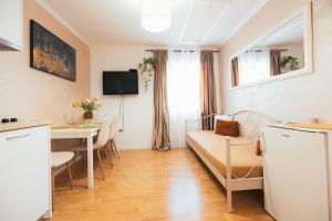 a living room with a couch and a table at Guesthouse Rebecca in Makarska