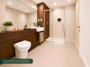 a bathroom with a toilet and a shower at CK Serviced Apartments, Titanic Quarter, Belfast in Belfast +31 photos