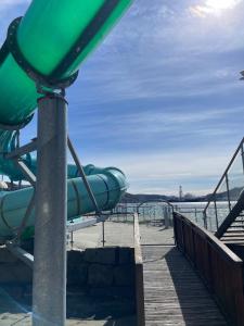 a water slide at a water park at Apartment with great sunset view! in Lyngdal