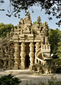 an ornate building in an indian temple at Appartement refait dans ancien hôtel restaurant in Saint-Uze