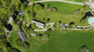 an overhead view of a park with trees and a road at Camp Sibley Hütte in Oberdambach