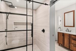 a bathroom with a shower and a sink at 229 #36 by SkyRun Aspen in Snowmass Village