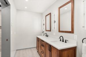 a bathroom with a sink and a mirror at 229 #36 by SkyRun Aspen in Snowmass Village +62 photos