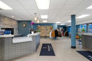 a store interior with blue walls and a counter with clothes at WorldMark Birch Bay in Birch Bay +29 photos