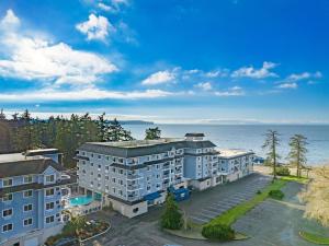 an aerial view of a building next to the water at WorldMark Birch Bay in Birch Bay