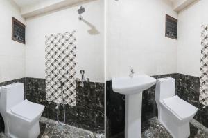 a bathroom with a toilet and a sink at HOTEL O PRAGATI in Gorakhpur