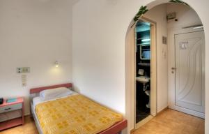 Postel nebo postele na pokoji v ubytování Armonia Hotel + 31 fotografií