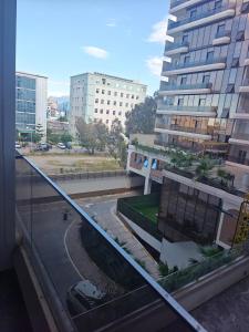 a view from a window of a city with buildings at Résidence nid d'abeille Béjaïa in Bejaïa