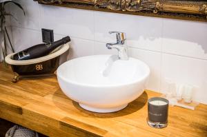 Koupelna v ubytování Boutique Hotel Mustaparta