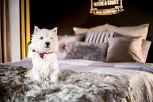 Postel nebo postele na pokoji v ubytování Boutique Hotel Mustaparta