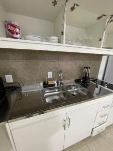 a kitchen with a sink and a counter top at Apartment 2 in Apóstoles