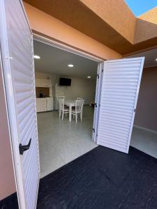 an open door to a room with a table at Apartment 2 in Apóstoles