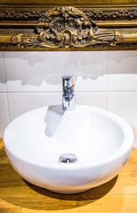 Koupelna v ubytování Boutique Hotel Mustaparta