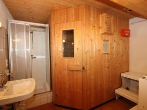 a bathroom with a shower and a sink at Bergheimat S in Huben +30 photos