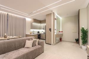 a living room with a couch and a kitchen at دار المصطفى in Al-Salam