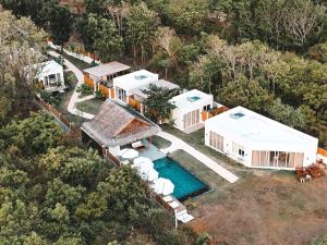 an aerial view of a house with a swimming pool at Villa Nindot - Private pool villas - Adults only in Siquijor