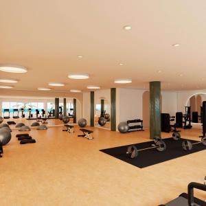 a gym with a large room with many exercise equipment at Perla La Paz, Tapestry Collection By Hilton in La Paz