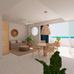 a living room with a couch and a table at Perla La Paz, Tapestry Collection By Hilton in La Paz
