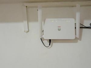a white appliance is hanging on a wall at Lindo recuerdos in Posadas
