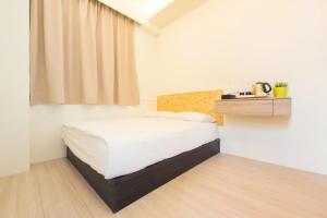 Postel nebo postele na pokoji v ubytování Hostel Jiizu
