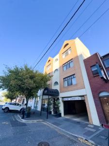 a building with a car parked in front of it at city unit at gouger st in Adelaide