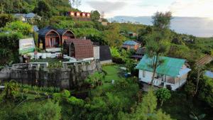 an aerial view of a house on a hill at Bali Sunrise Camp & Glamping in Kintamani
