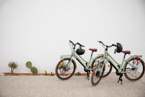 a couple of bikes parked next to a wall at The Monty in Anglesea
