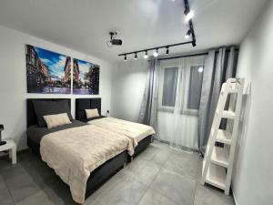 a bedroom with a bed and a ladder in it at Villa Rico - Kalno in Kalno