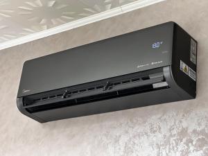 a printer sitting on top of a wall at Robezu Street House in Liepāja
