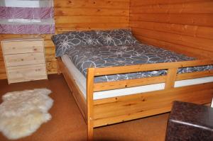 Letto o letti in una camera di Holzhaus in Hinterstoder