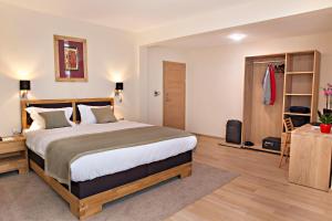 Postel nebo postele na pokoji v ubytování Hotel Aziza