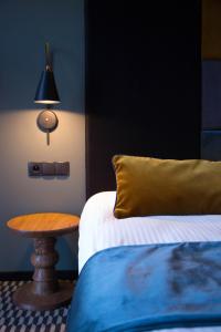 Łóżko lub łóżka w pokoju w obiekcie Hotel Remes