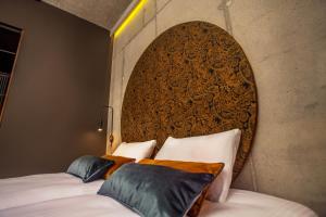 Łóżko lub łóżka w pokoju w obiekcie Hotel Remes