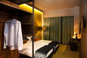 Łóżko lub łóżka w pokoju w obiekcie Hotel Remes