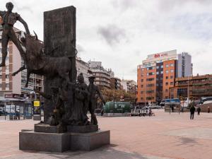 a statue in the middle of a city at Ibis Madrid Centro las Ventas in Madrid