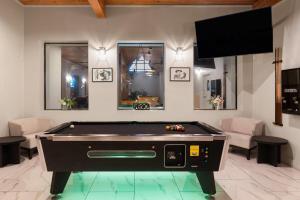 a billiard room with a pool table in it at The Hotel Pendleton, Trademark Collection by Wyndham in Pendleton