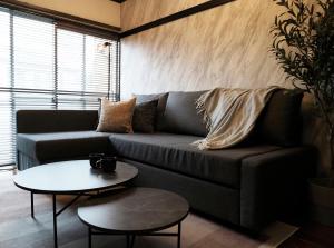 a living room with a couch and a table at #52 Towny Yanagihara in Numazu