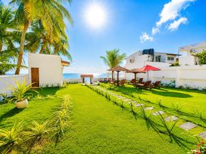 a view of the backyard of a villa at Dutch Bay Villa - Trincomalee in Trincomalee